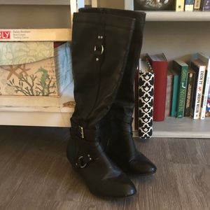 Synthetic black leather boots